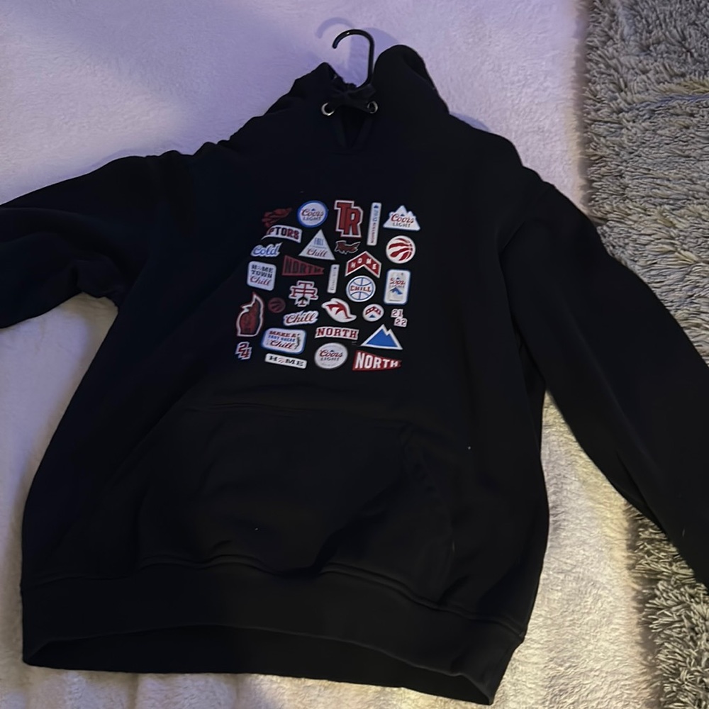 Black hoodie from peace collective